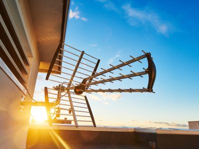 directional antenna for digital television broadcasting DVB-T over of blue sky and sunset. Satellite or cable TV or broadcast.